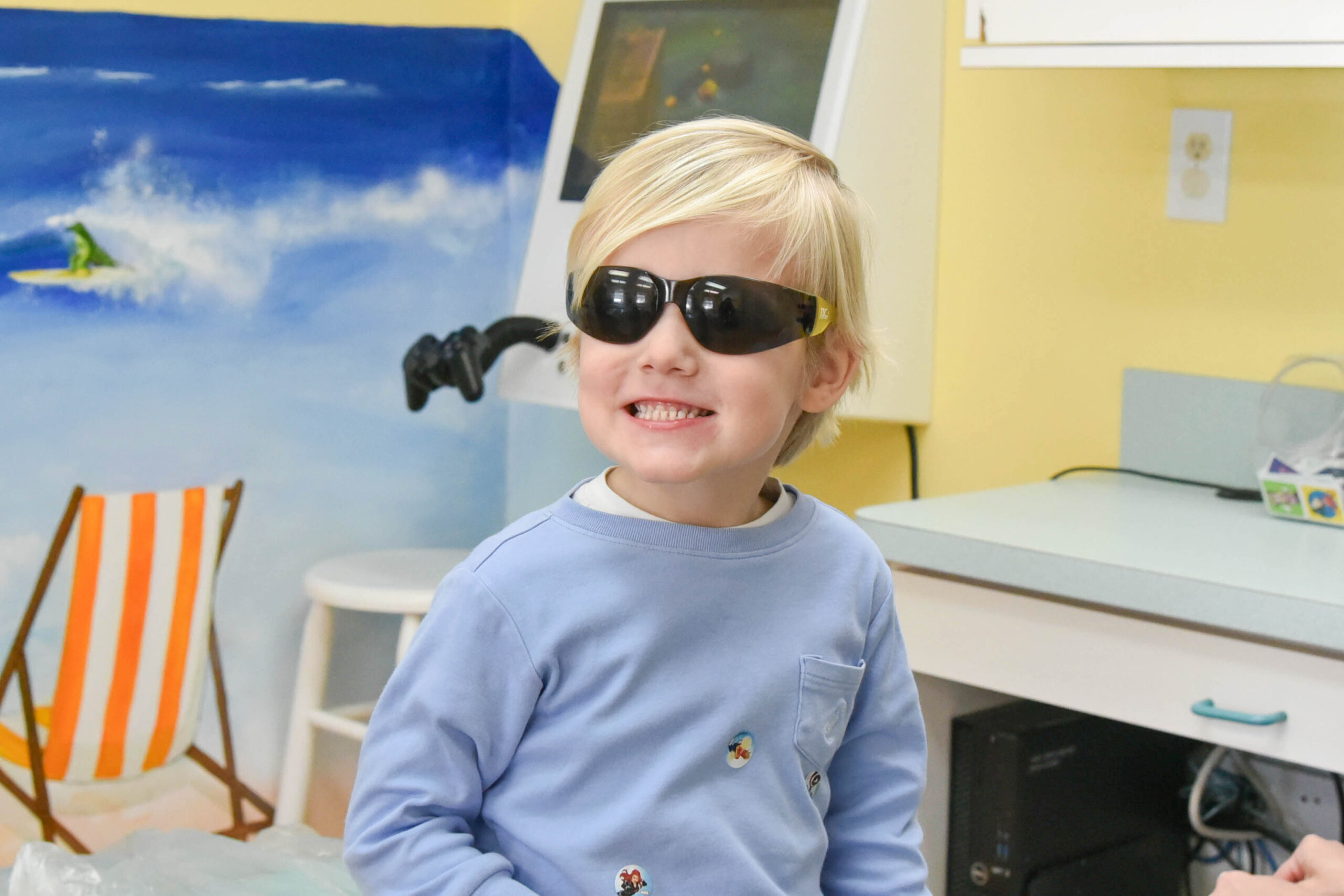 Happy child smiling dentist office extractions